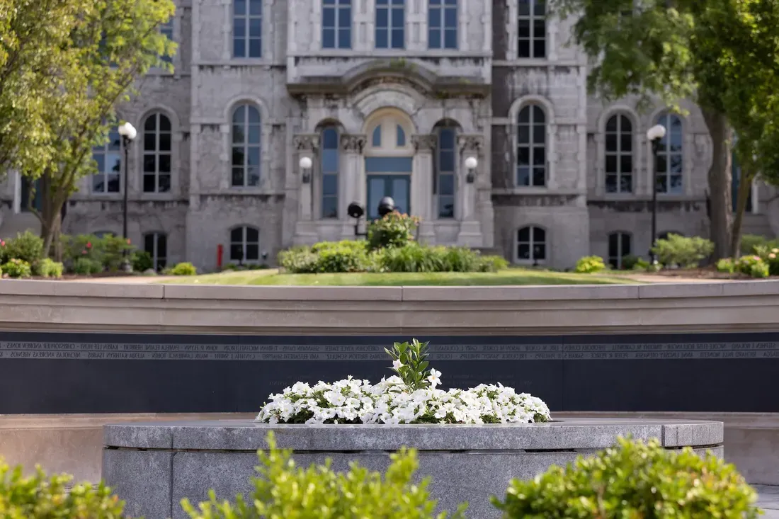 Campus in the spring with flowers.